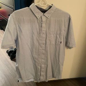 Casual button down; light blue.